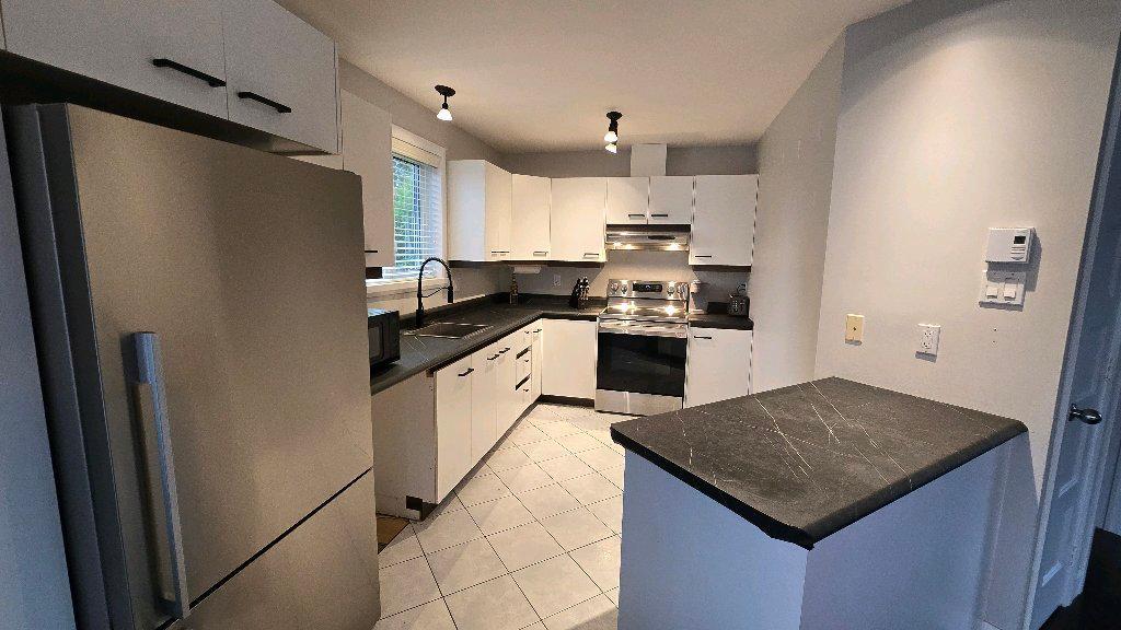 Jumelé à louer 2 chambres 1.5 salles de bain | 2845981