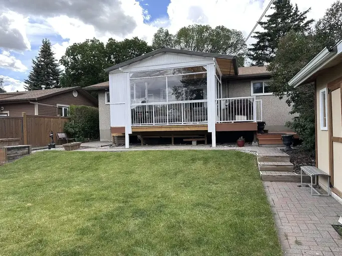 Inner City Gem: Exceptional 3 Bedroom Bungalow with Sun Room and 2 tier deck | Calgary | 2884891