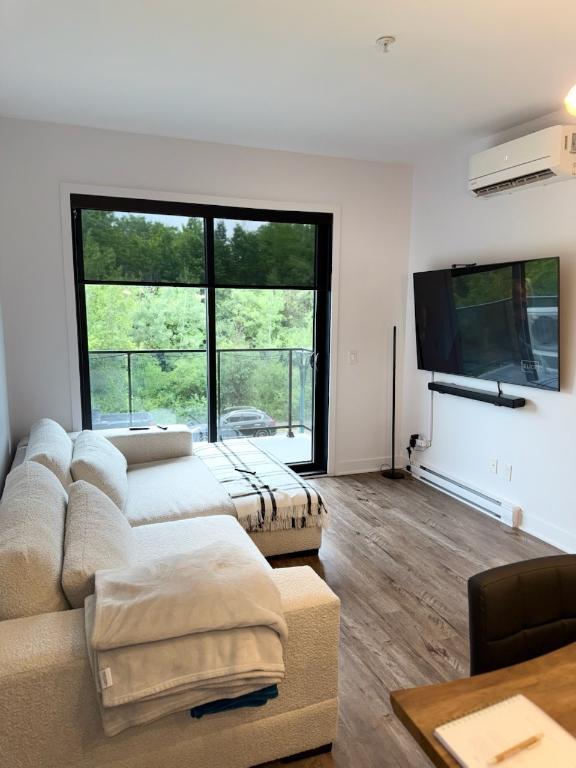 Duvernay condo 4 1/2 chauffé +2 garages, tout inclus avec 5 électro | 2882253