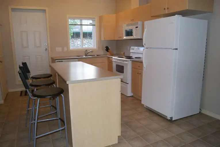 2 Bed 2 Bath Townhouse with Heated Private Garage in Timberlea | 7105 - 200 Lougheed Drive, Fort McMurray | 2895549