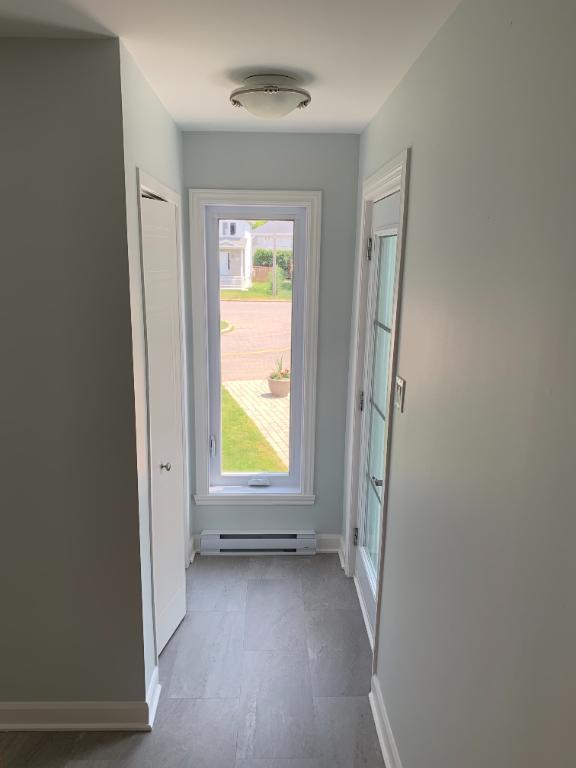 Logement 6 1/2 style semi-détaché dans triplex Vaudreuil-Dorion | 2898145