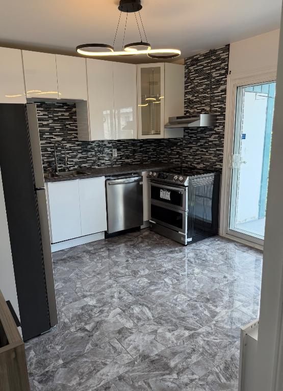 Grand 4 1/2 disponible nouveau Rosemont 1 août ou avant | 2927427