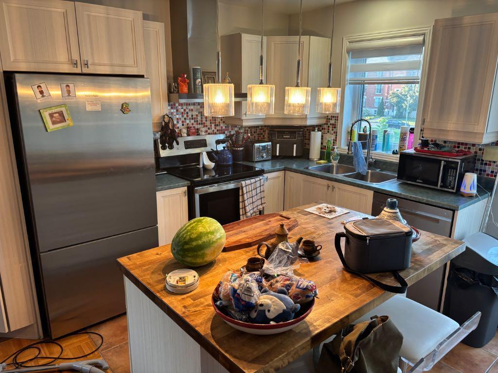 Condo 2 étages 2 chambres à coucher et une salle de bain | 2936429