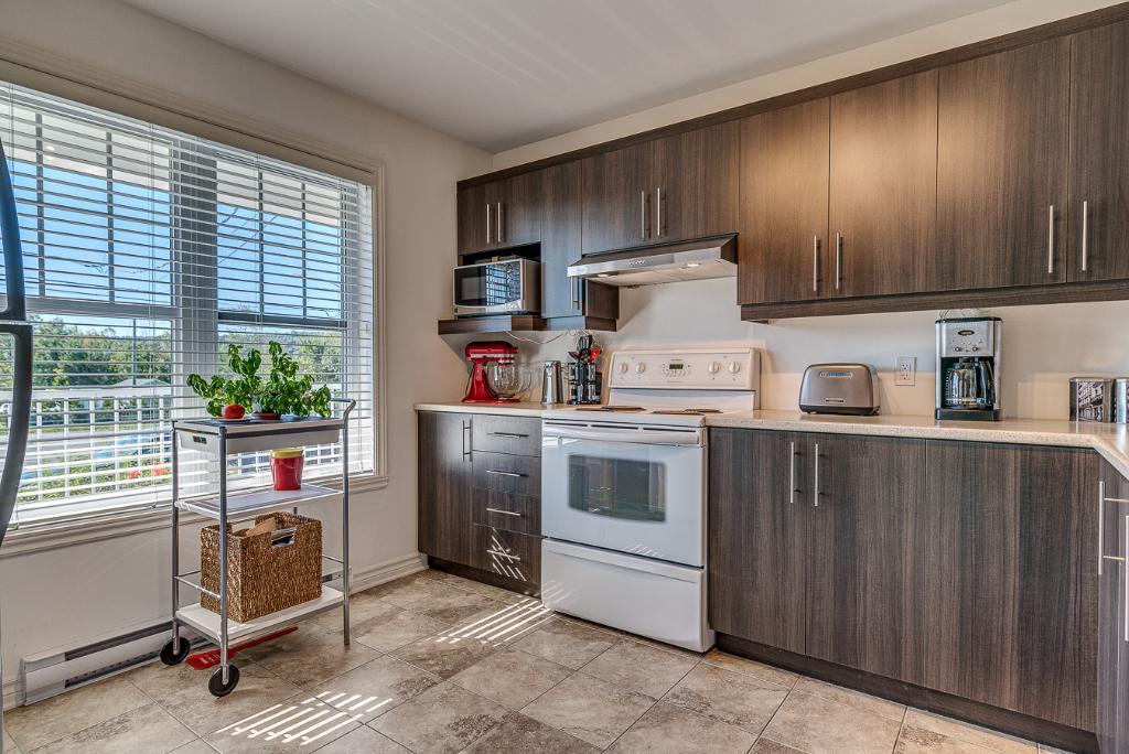 TRÈS GRAND 7 ½ - 2 étages (style maison de ville) + sous-sol À PRÉVOST | 2937973