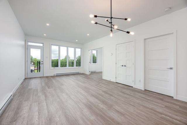 Grand appartement 5 ½ moderne à louer à Sutton – Logement lumineux, spacieux et entouré de nature ! | 2948176