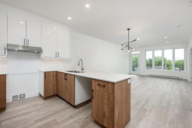 Grand appartement 5 ½ moderne à louer à Sutton – Logement lumineux, spacieux et entouré de nature ! | 2948176