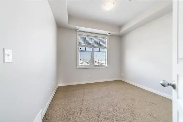 TWO BEDROOM TOWNHOUSE TOP FLOOR GREAT VIEW FROM SOUTH FACING BALCONY $1600 | 193 Cranford Walk Southeast, Calgary | 2961291