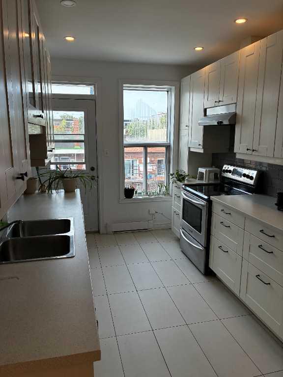 Appartement 4 1/2 , dans la petite Italie | 2964351