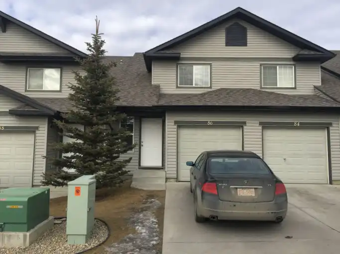 Bi-Level Panorama townhouse | 86 Panatella Villas NW, Calgary | 2965859