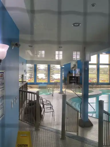 40+  Building - Cozy Top Floor Condo, Many amenities | 151 Country Village Road Northeast, Calgary | 2975349