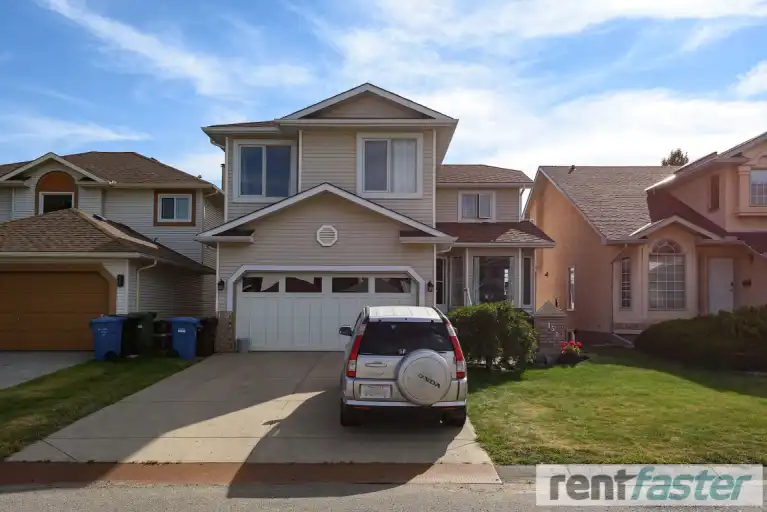 Lake access! Spacious furnished, bright, modern 2-bedroom walkout in Arbour Lake | Calgary | 2977525