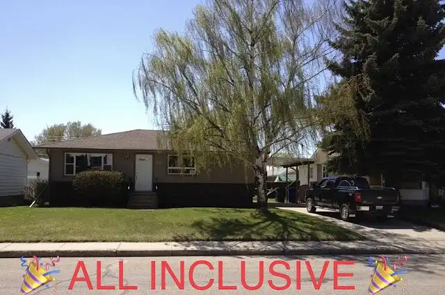 All Inclusive Upper Executive Suite | 5313 50 Street, Olds | 2982164