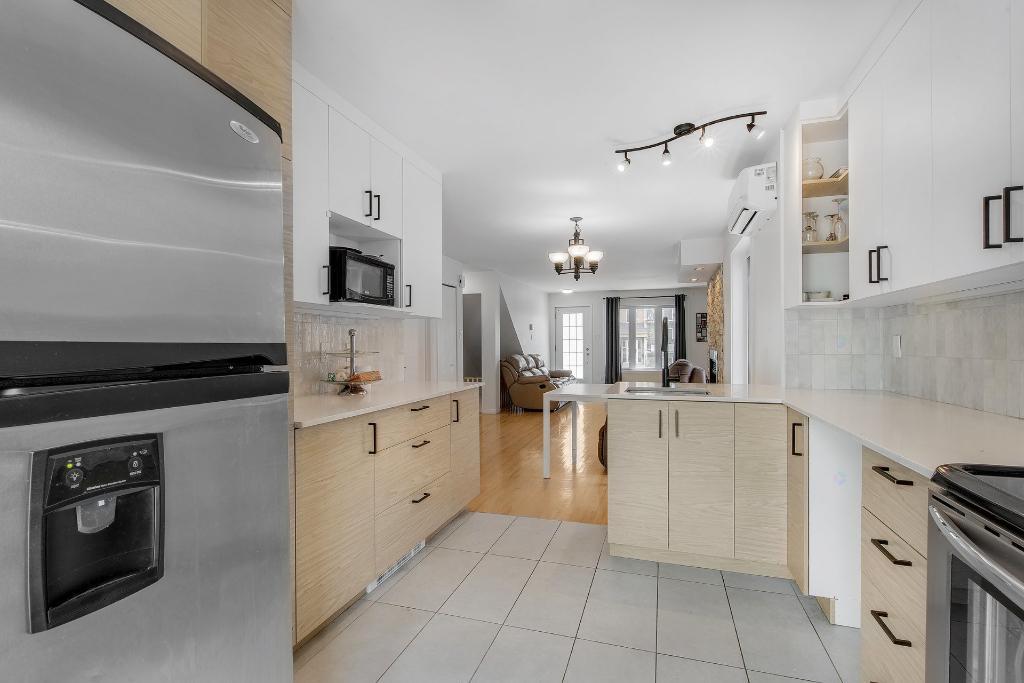 Grand 4½ avec garage à l'île Saint-Jean | 2991392