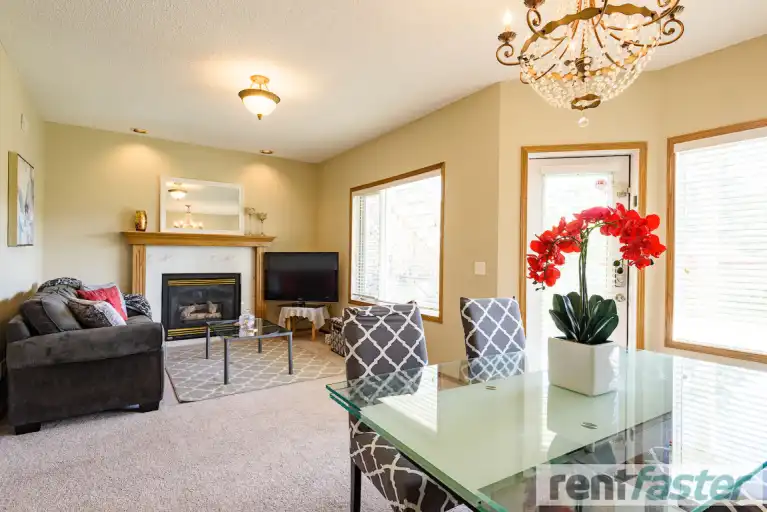 Lake access! Spacious, furnished and bright 2-bedroom walkout in Arbour Lake | Calgary | 3022678