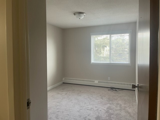 104 & 116, 6108 - 53 Street, Olds | 6108 53 Street, Olds | 3001995