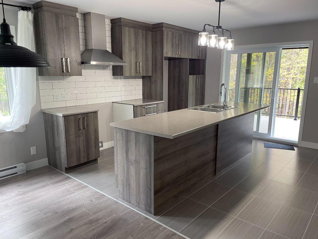 Beau grand 4 1/2 moderne. Immeuble pratiquement neuf (construction 2021) | 3022131