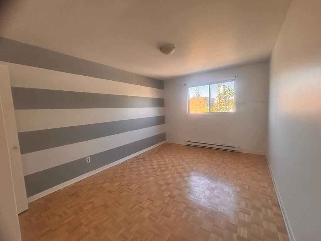 4 1/2 rue Front Longueuil disp immédiatement ac/stationnement | 3022133