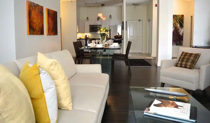 Eau Claire Hidden Gem, 10' ceilings, gym, southwest  patios, upscale furnighings | Calgary | 3059335