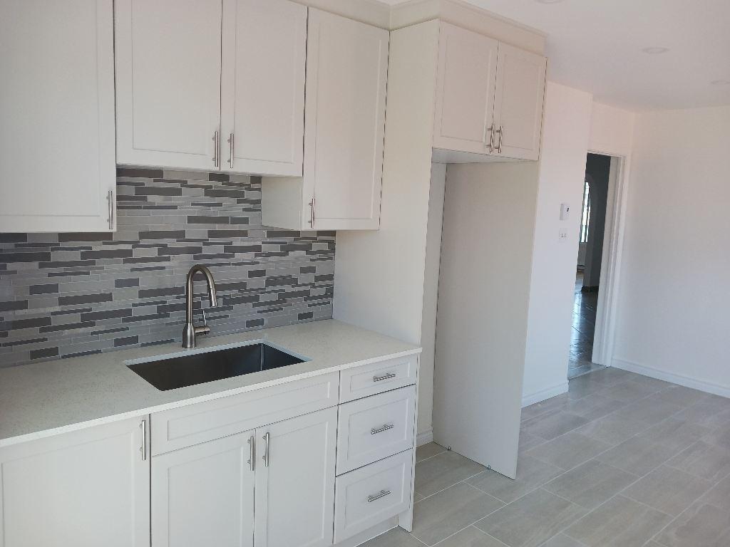 Grand 5-1/2 rénové haut de duplex - STL | 3059397