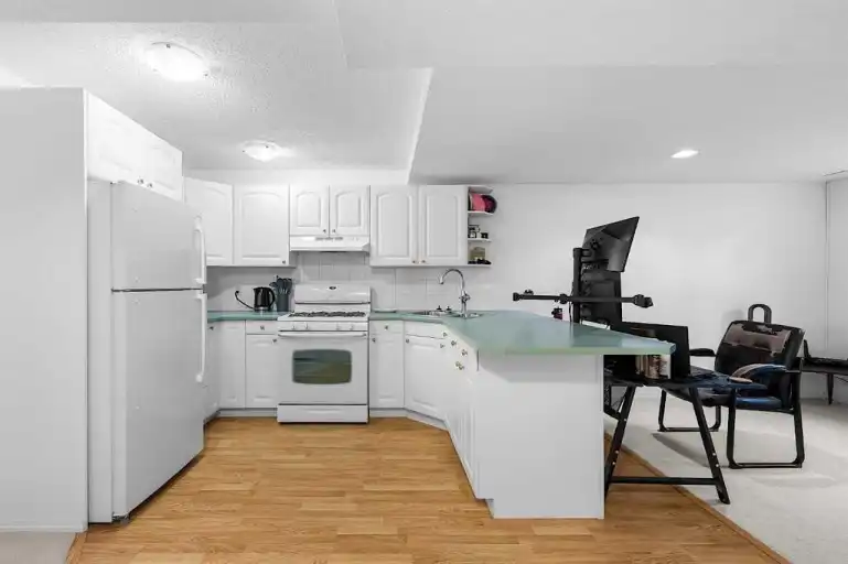 Bright 1-Bedroom + Den Basement in Killarney with Parking, A/C & Laundry | Calgary | 3063390