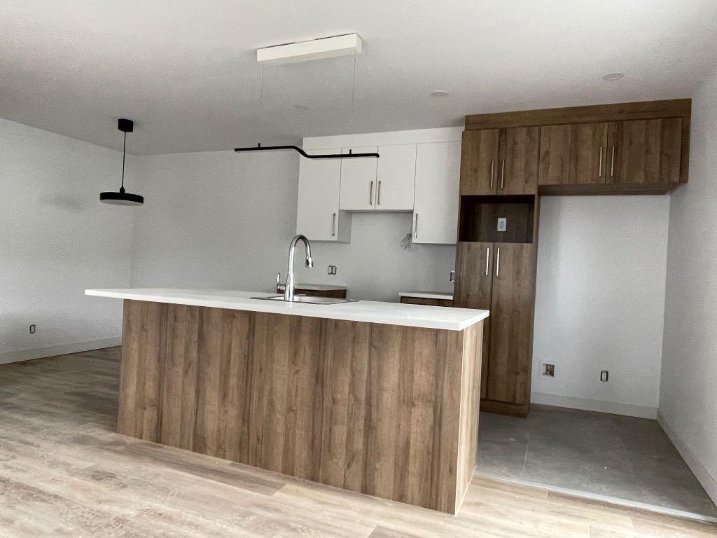 Grands 5½ demi-sous-sol, construction neuve | 3074516