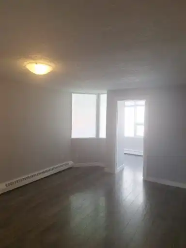 1BR + Den Converted to 2BR — Heated Parking, In-Suite Laundry, Steps to 17 Ave | 504 - 626 15 Avenue Southwest, Calgary | 3090224