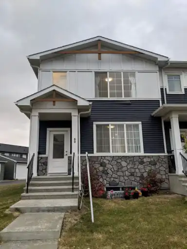 Bright Cozy 3-Bedroom Home with Double Garage, Large Backyard & Pondside Living | 60 Amblefield Terrace Northwest, Calgary | 3120925