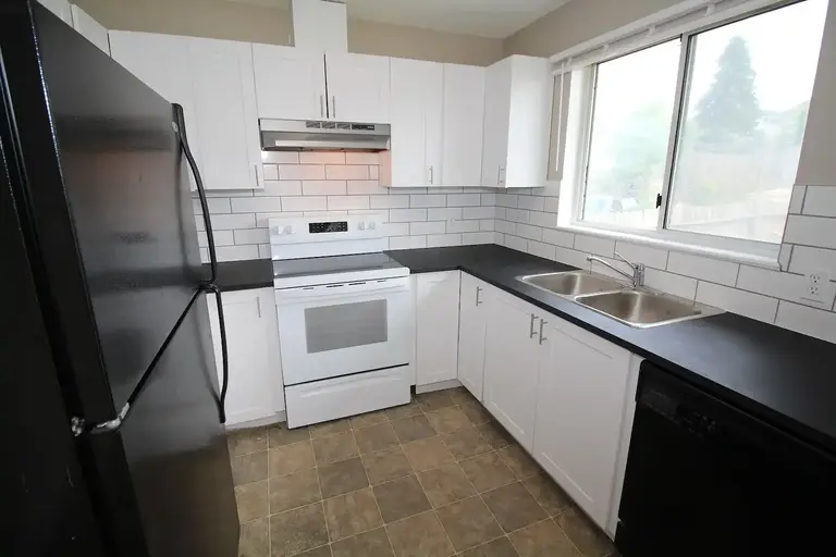 Just Renovated 4 Bedroom House - Fenced in Backyard | Calgary | 3157622