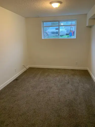 A bedroom in a basement suite – Quiet, Private, All Utilities Included | Coverdale Way NE, Calgary | 3135636