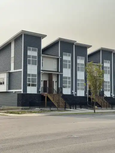 Modern 3-Bedroom Townhome Backing onto Pond & Pathways in Walden | 122 - 122 Walden Lane Southeast, Calgary | 3158770