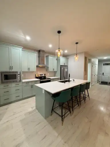 3.5 Beds 2.5 Baths - House (Extended garage+EV Charging) Main floor only. | 44 Edith Mews Northwest, Calgary | 3151009