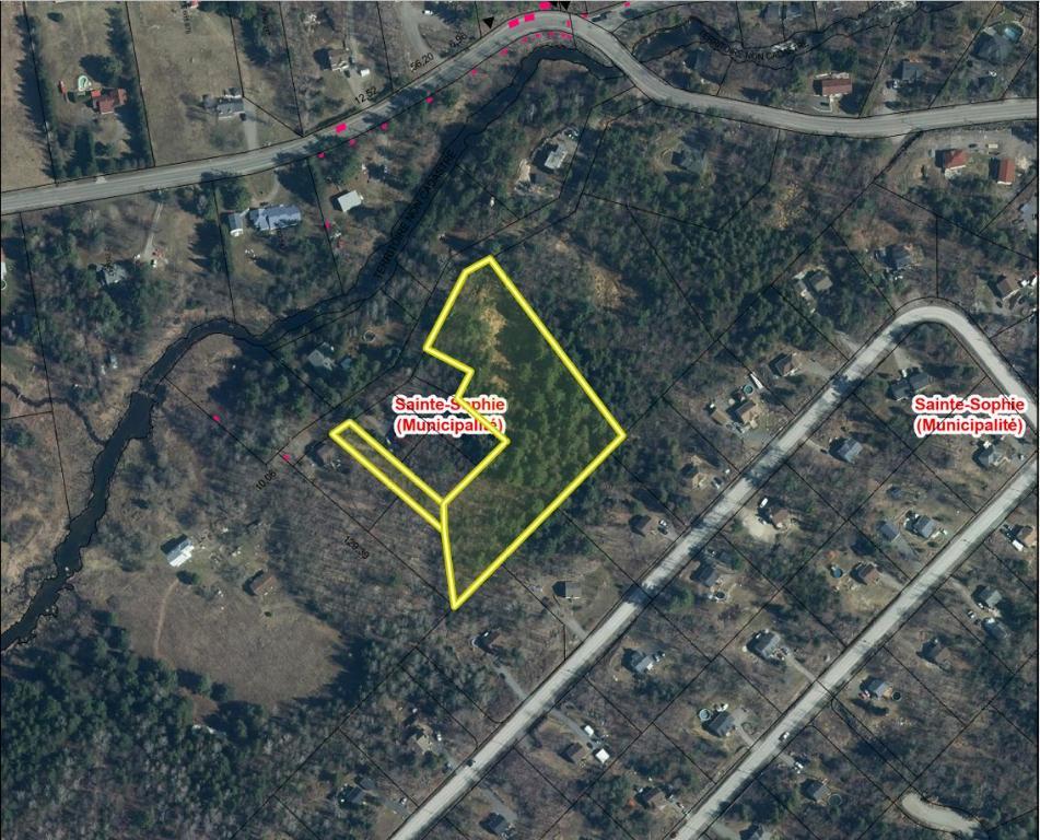 Magnifique terrain boisé dans un secteur en développement à Ste-Sophie | 3160567