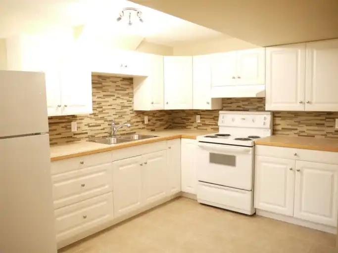 Large1200sf Renod 2BR Bsmt-INCLUDES UTILITIES-newer kitchen/bath+own yard-Pet ok | 6090 Madigan Drive NE, Calgary | 3162969