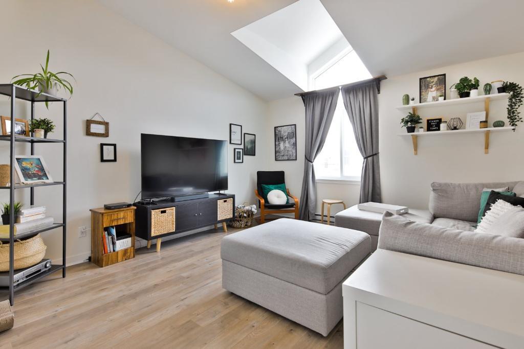 Grand 4 ½ de style condo entièrement rénové – Dernier étage d’un triplex à Sainte-Thérèse ! | 3166232