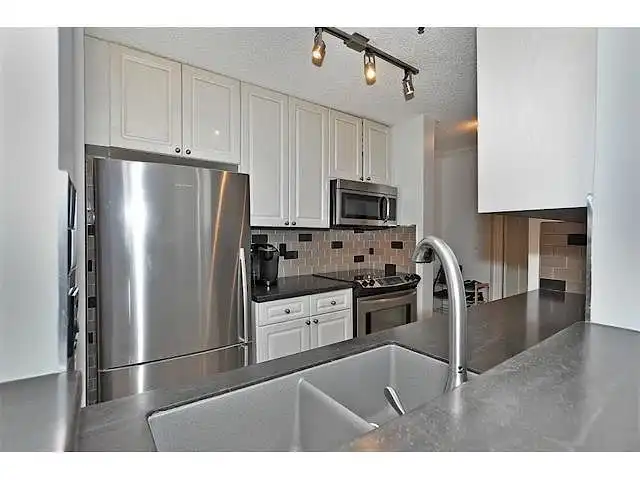 "2300/MONTH, ALL INCLUSIVE, INDOOR HEATED PARKING INCLUDED" | 727 56 Ave SW, Calgary | 3174026
