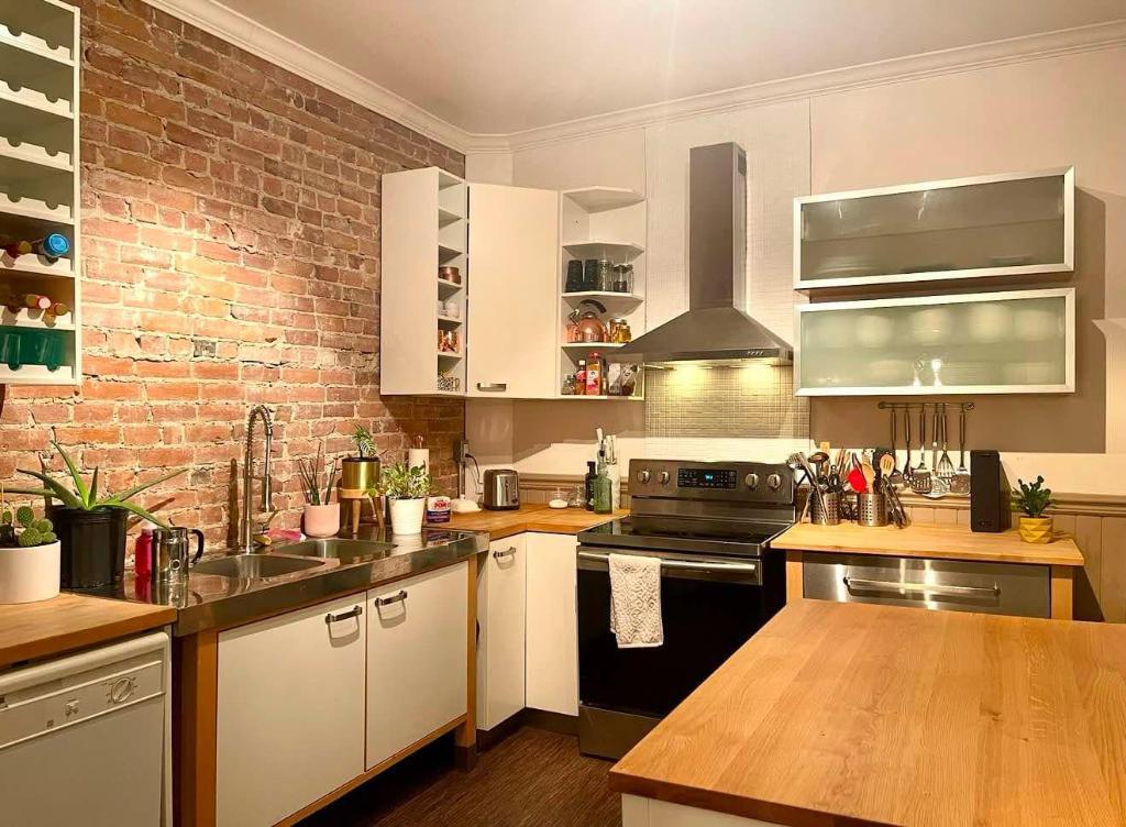 Superbe 5 1/2 de 1200 pi2 alliant cachet d’époque et confort dans HOMA | 3178312