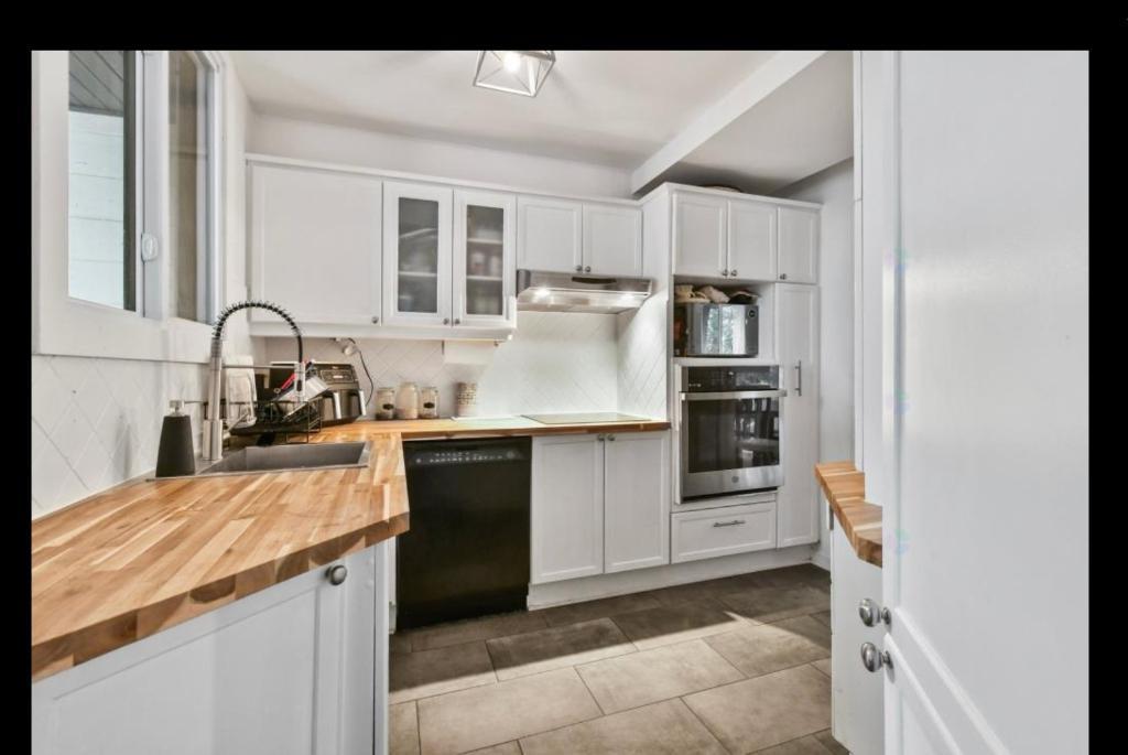 6 1/2 avec cour et garage - près du métro Longueuil | 3198240