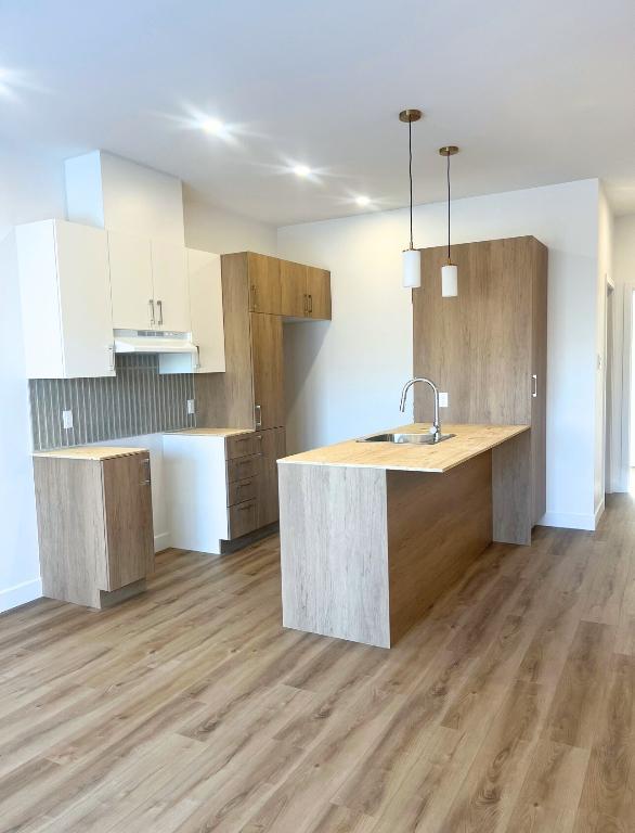 3 1/2 condo locatif neuf | 3200609