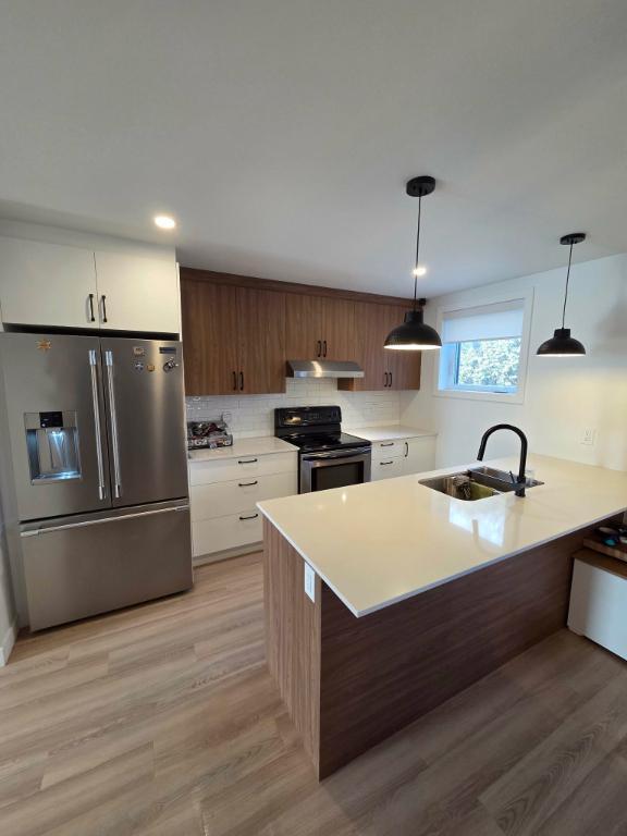 Grand 4½ Neuf 2024 – Demi Sous-sol – Parking – Balcon – Walk-in | 3201049