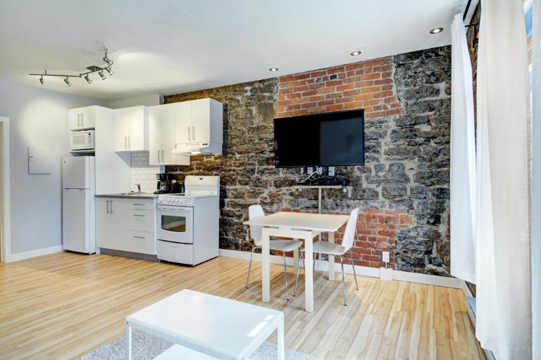 Loft entièrement meublé à louer Vieux-Québec juillet 2026 | 3201476