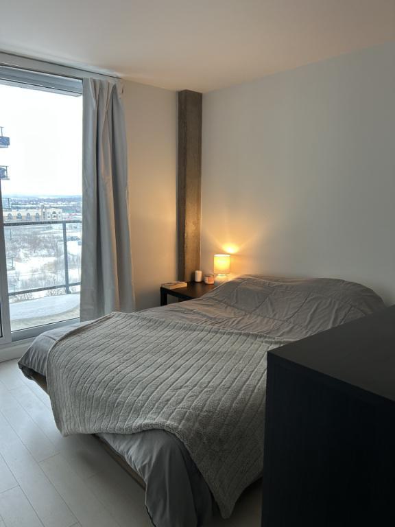Condo 4 1/2 + bureau chauffé, éclairé à louer à Lévis – Immeuble Le Proxi | 3201581