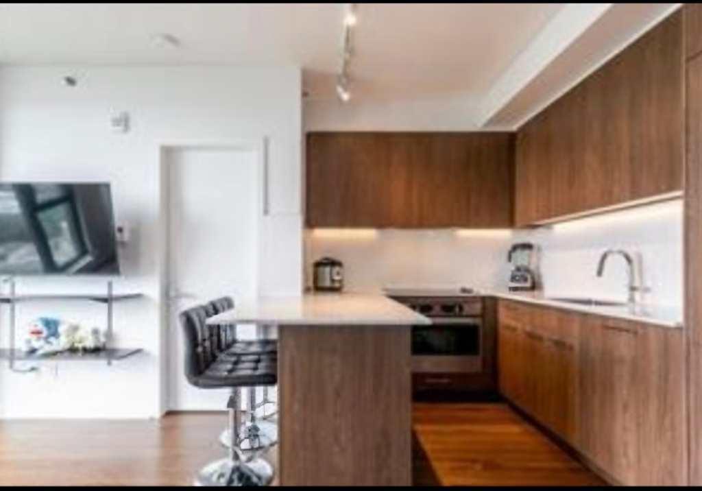 🏙️ Condo meublé 2 ch + stationnement intérieur – Centre-ville | 3202242