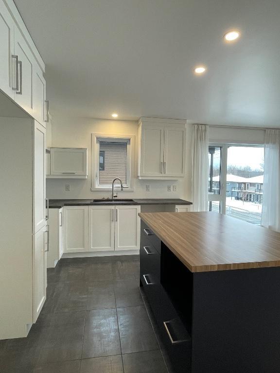 Appartement 4 1/2 incluant une Terrasse au toit | 3206265