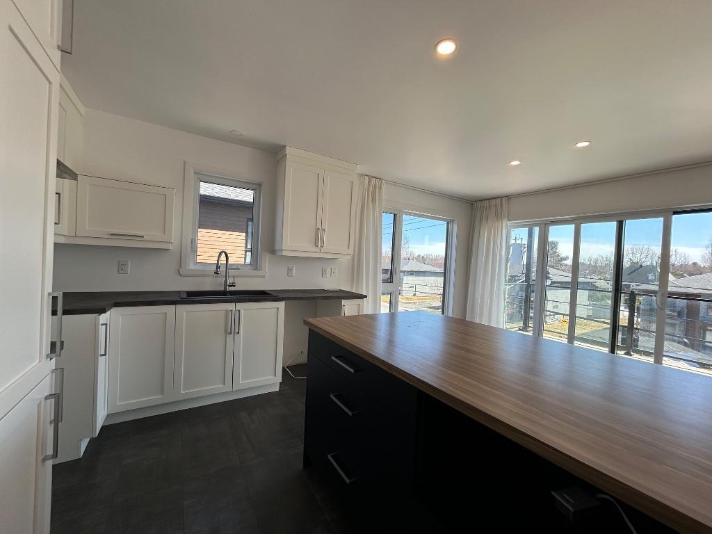 Appartement 4 1/2 incluant une Terrasse au toit | 3206265