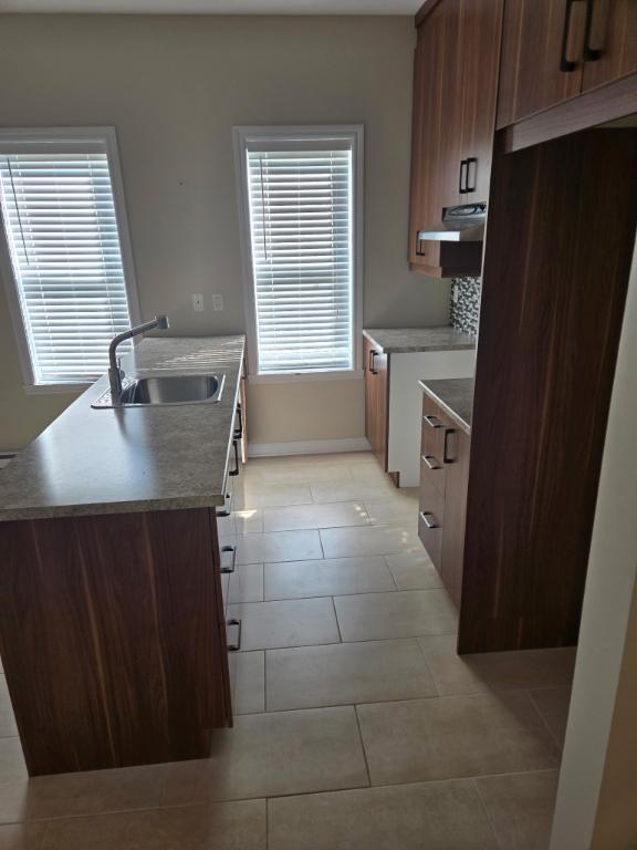 3 1/2 “mini-maison style condo locatif” | 3210450