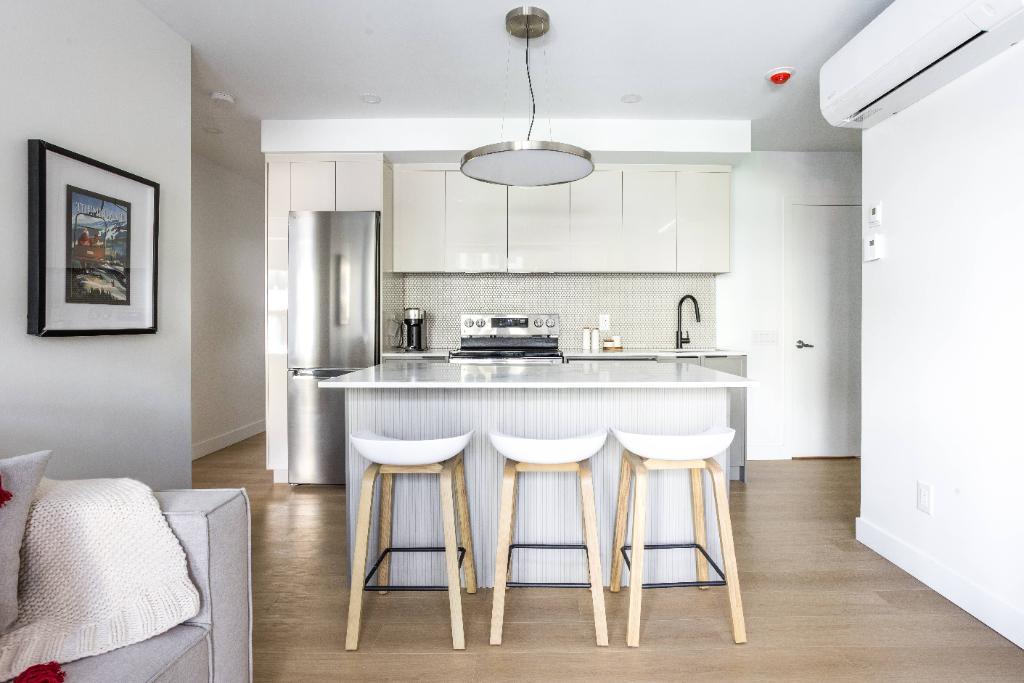 Unité Mackenzie — Modèle rez-de-jardin | 2 chambres | Terrasse privée | 3210780