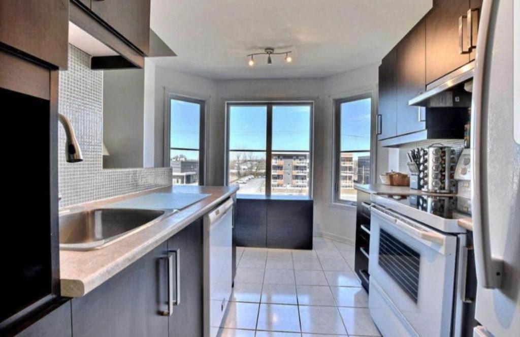 BROSSARD CONDO 4 1/2 + GARAGE | 3210908