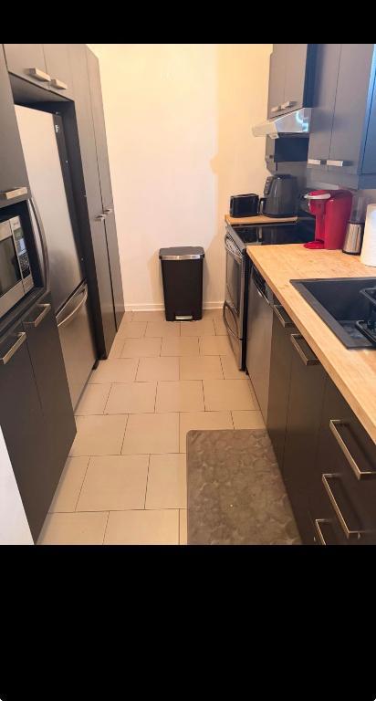 Condo 4 /1 2 à louer immédiatement! | 3215241