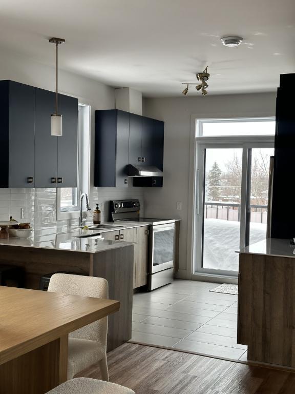 Très grand 4 1/2 St-Janvier Mirabel | 3229029