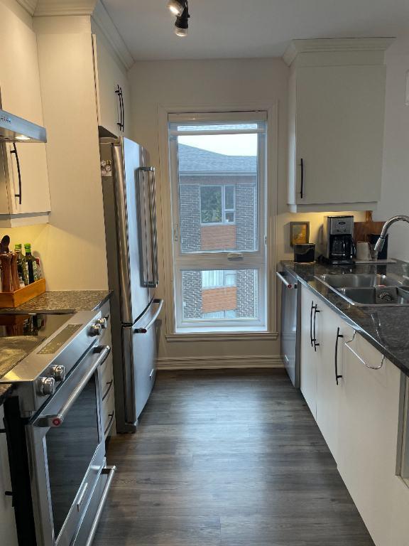 LUXUEUX CONDO 4 ½ - dernière étage (3e)+ GARAGE + Remise – 2050$ | 3229730